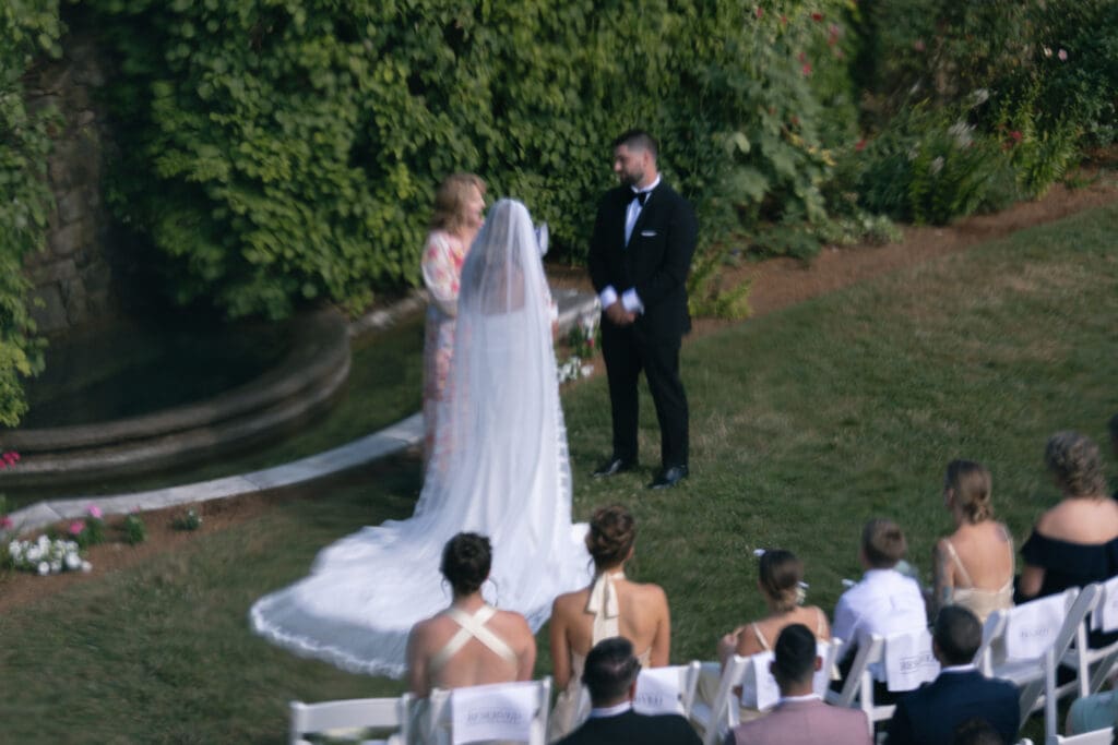 Bride and groom at the end of the alter.