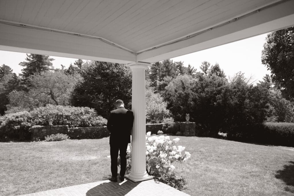 Groom waiting for his bride for the first look.