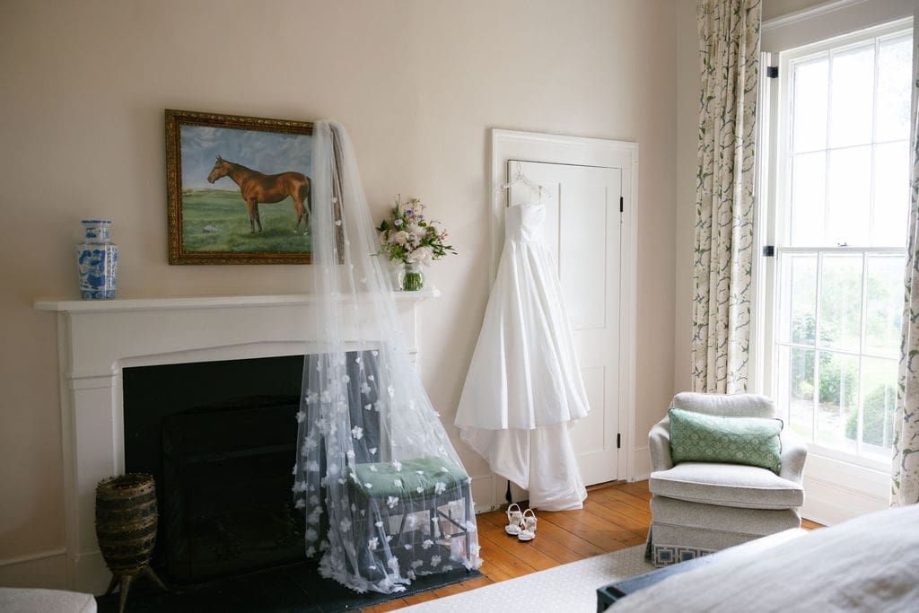 A wedding dress hanging in the bridal suit at Ashbourne Farms, in La Grange, Kentucky. 